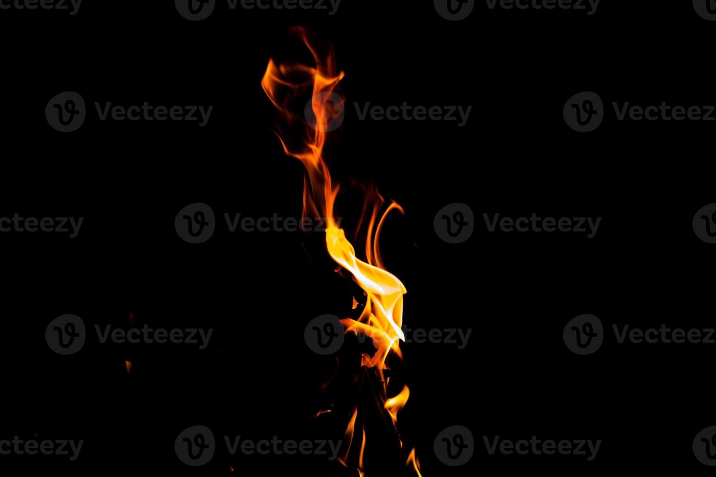 Fire flame texture. Burning material backdrop. Burn effect pattern. Blaze and torch wallpaper. Heat and haze backdrop. photo