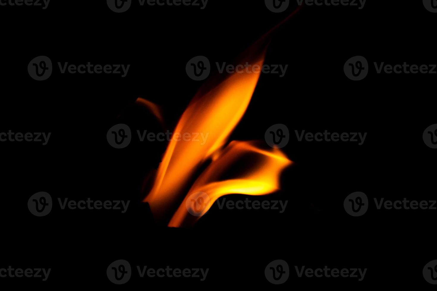 Fire flame texture. Burning material backdrop. Burn effect pattern. Blaze and torch wallpaper. Heat and haze backdrop. photo