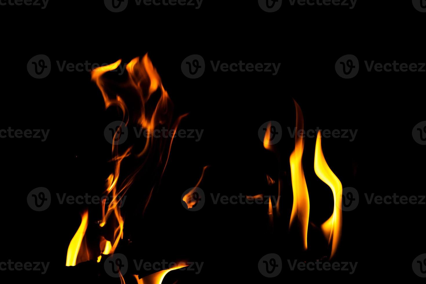 Fire flame texture. Burning material backdrop. Burn effect pattern. Blaze and torch wallpaper. Heat and haze backdrop. photo