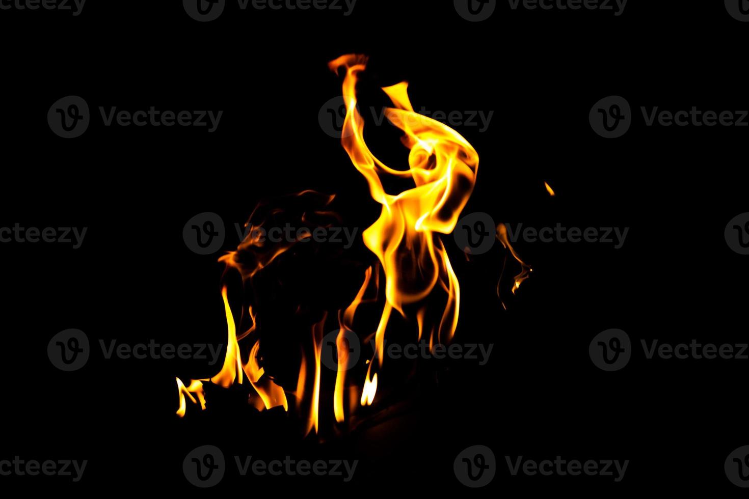 Fire flame texture. Burning material backdrop. Burn effect pattern. Blaze and torch wallpaper. Heat and haze backdrop. photo