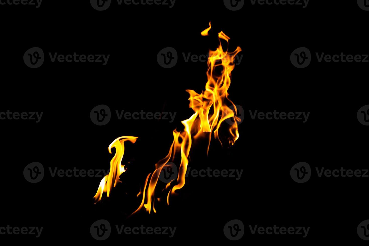 Fire flame texture. Burning material backdrop. Burn effect pattern. Blaze and torch wallpaper. Heat and haze backdrop. photo