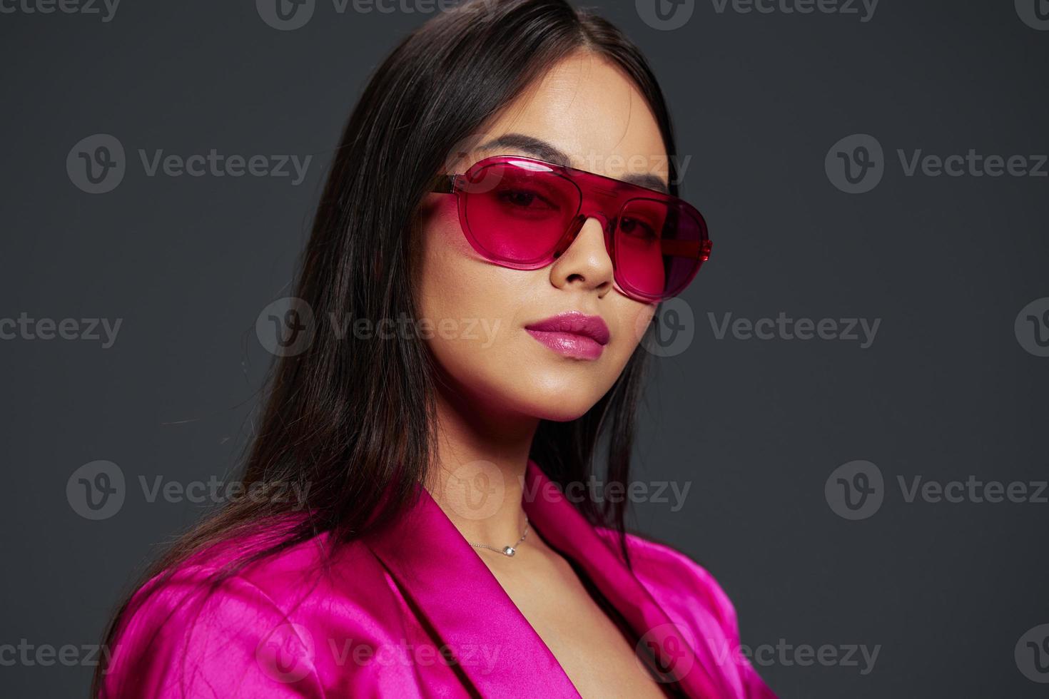 woman in pink dress red glasses fashion makeup glamor isolated background photo