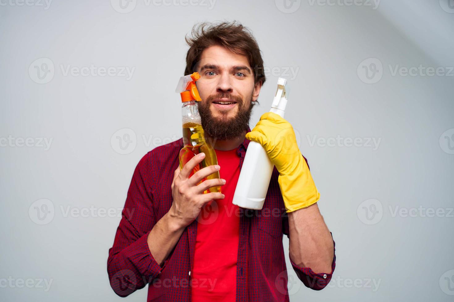 Cheerful cleaner detergent home care hygiene gray background photo