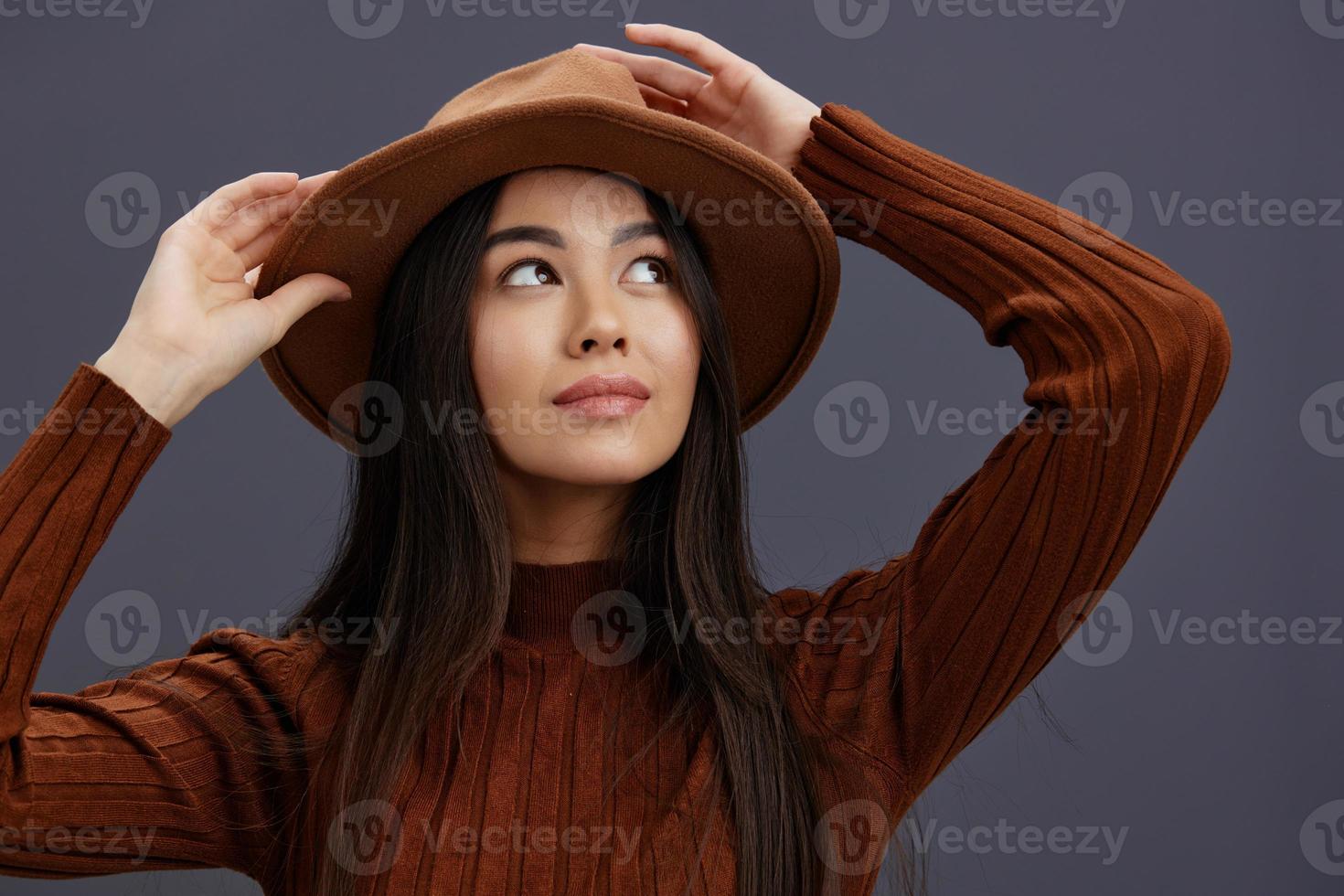 Brunette brown sweater glamor posing smile fashion Gray background photo