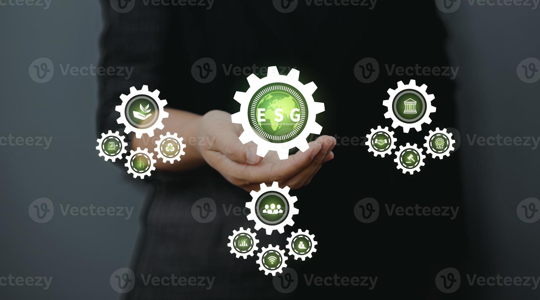 Hand holding a green globe in the concept of nature about management esg, sustainability, ecology and renewable energy for save the world environmental and conservation photo