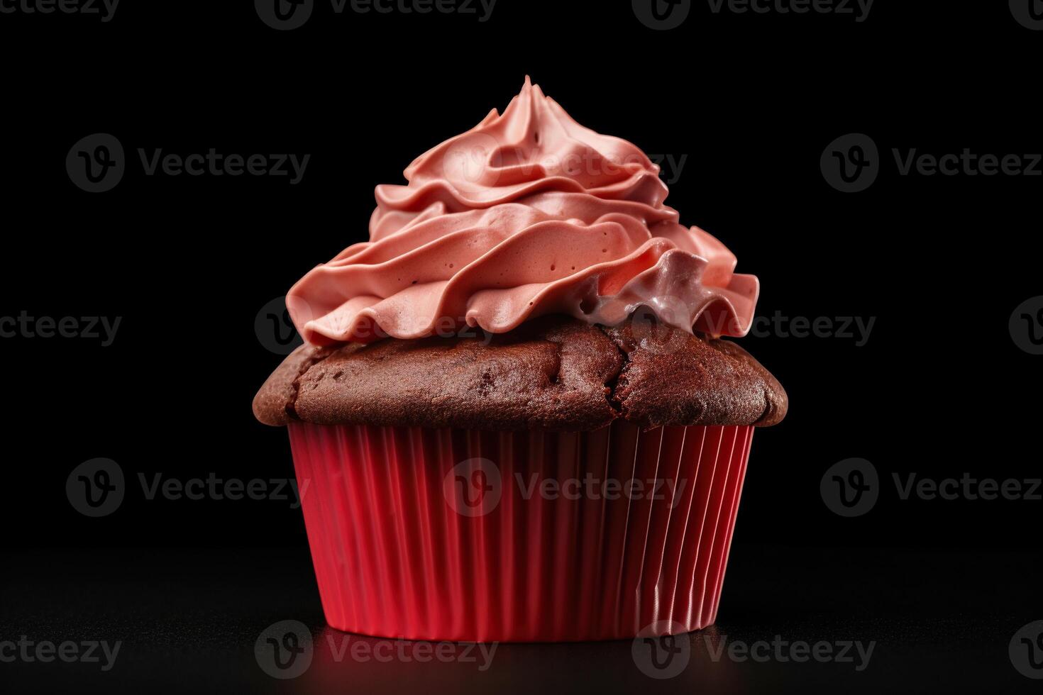 Delicious photo of highly detailed red cupcake against a dark background