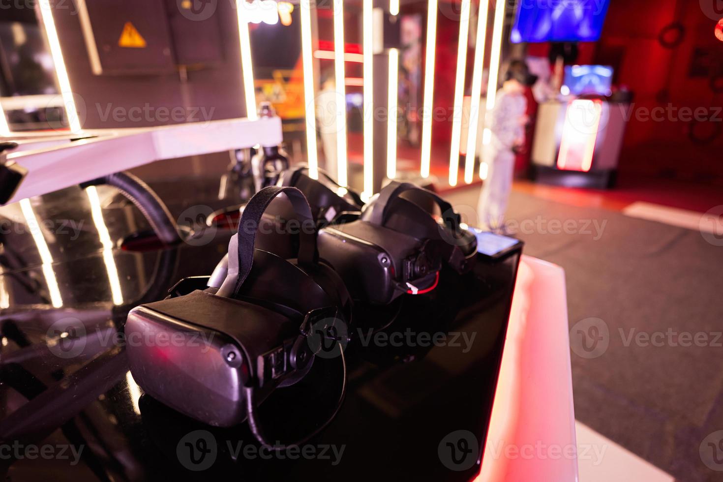 Row of VR glasses in play zone room. photo