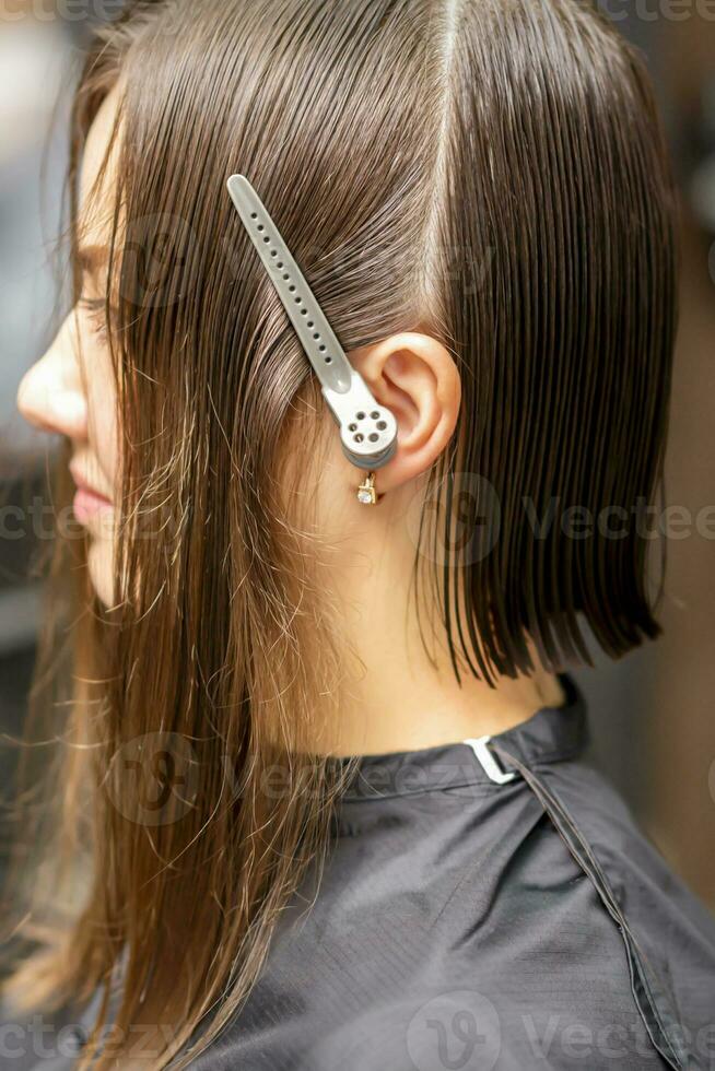 Brunette woman with split hair photo