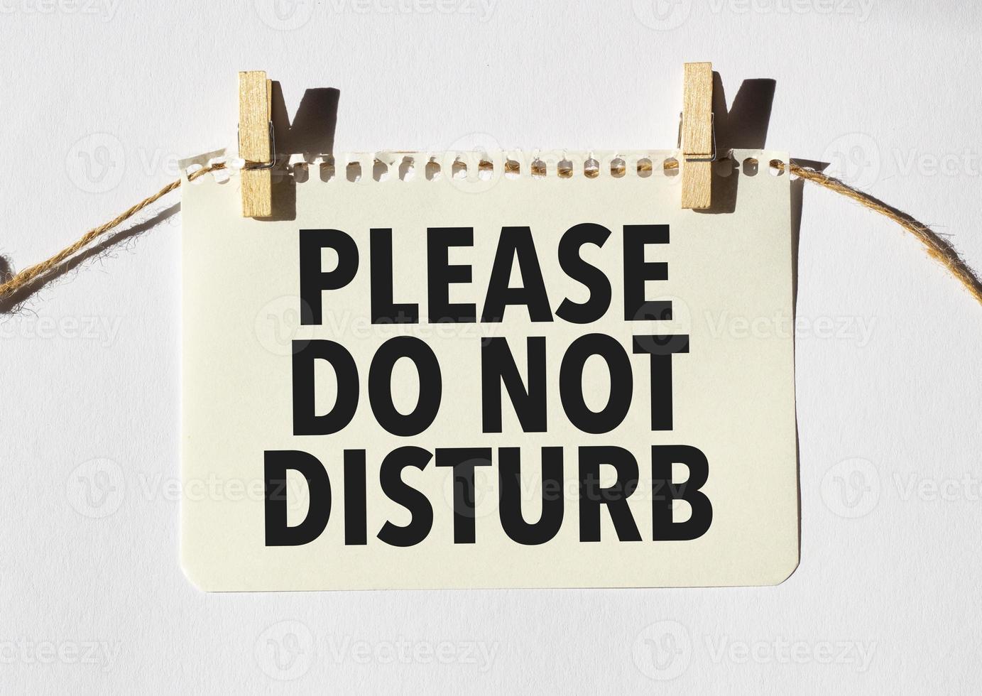 Card with text please do not disturb. Diagram and white background photo