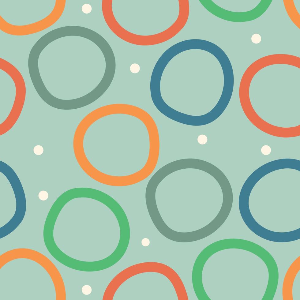Multi-colored circles on a green background. Vector seamless background, attractive design, childish doodles suitable for general background.