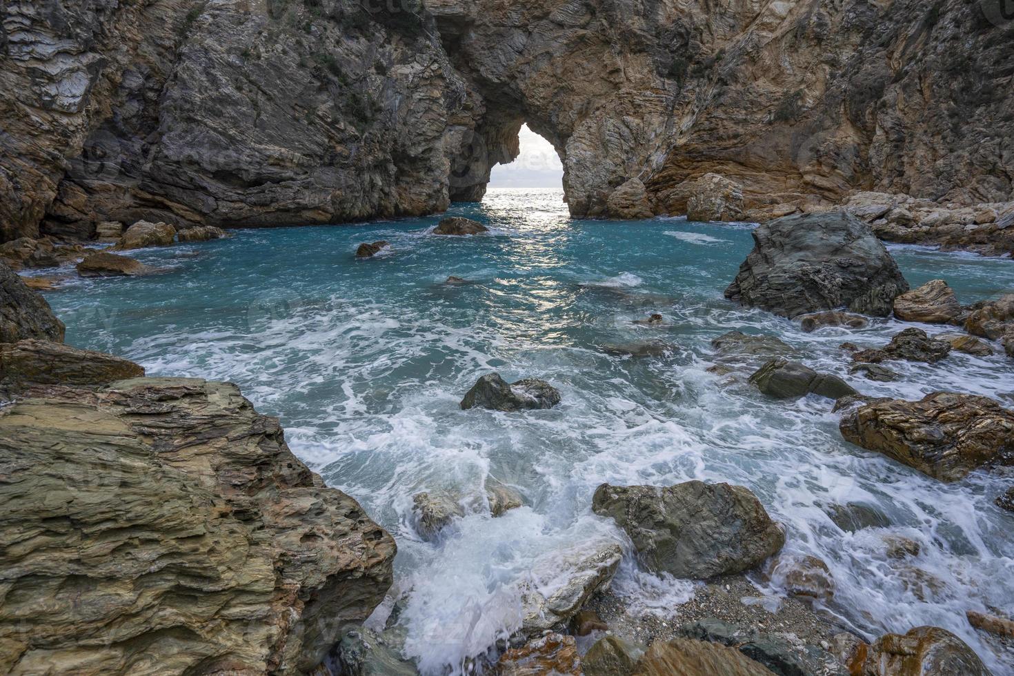 magnificent view of the sea and sun in the cliffs, natural pool photo