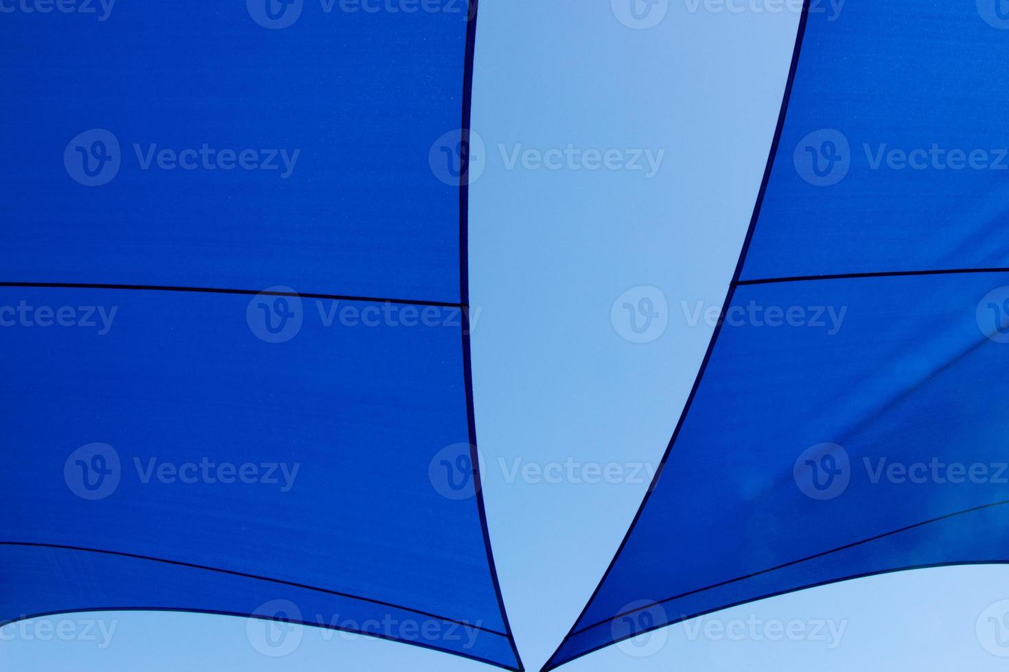 blue sunshade in the sky photo