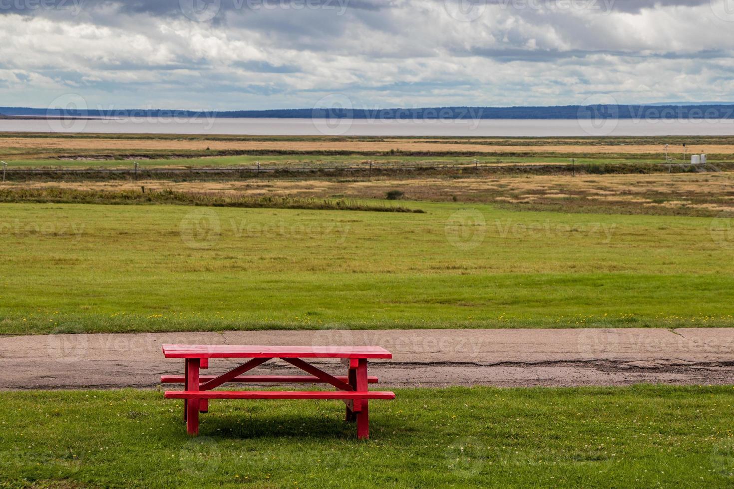 Red picnic table at a seaside park in Nova Scotia, Canada 22465617