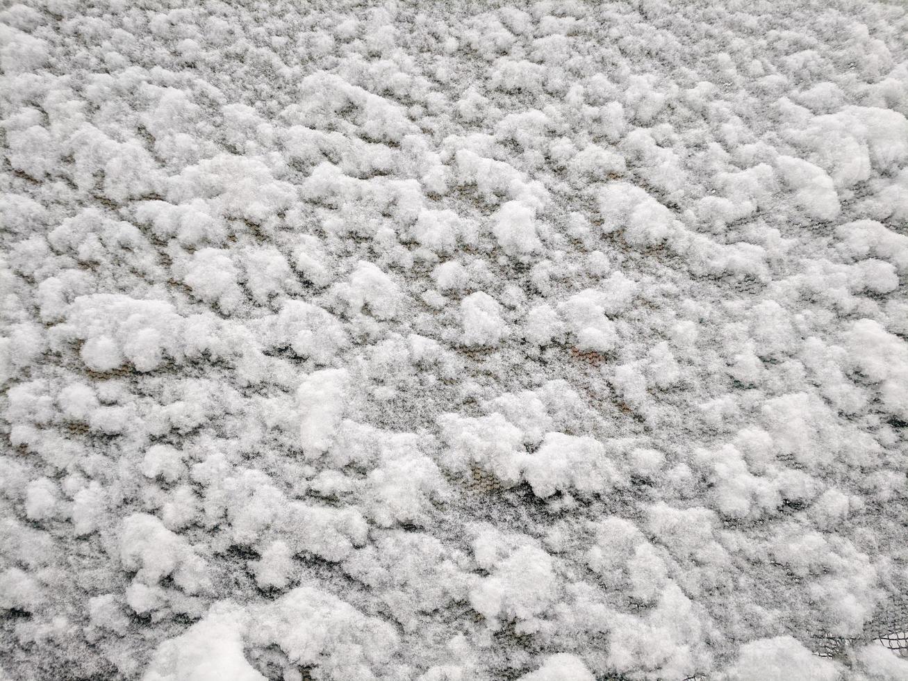 Texture of fresh snowy cloth Winter snow background photo