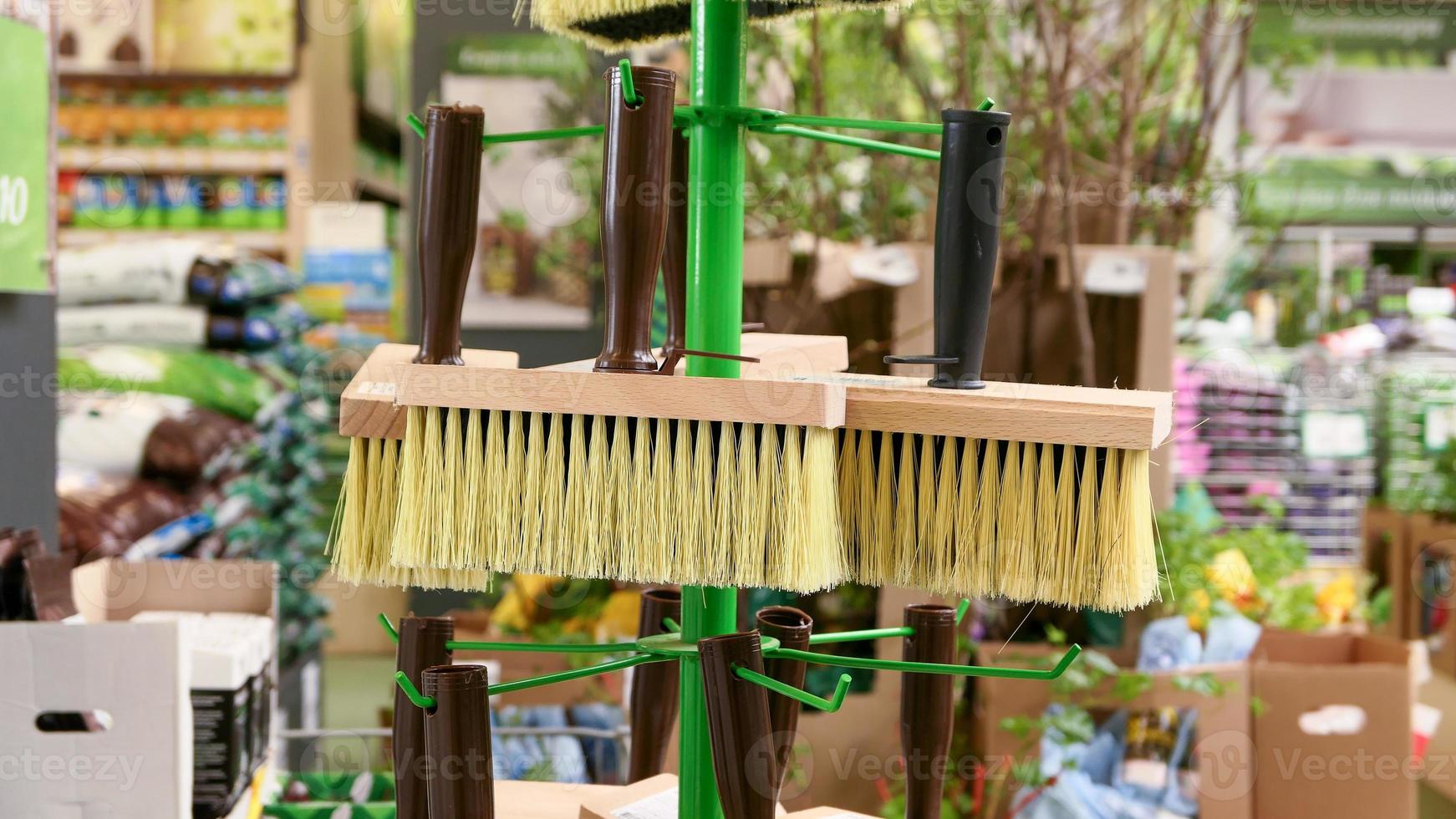 Rectangular wooden brush with synthetic bristles for painting and glue in the store photo