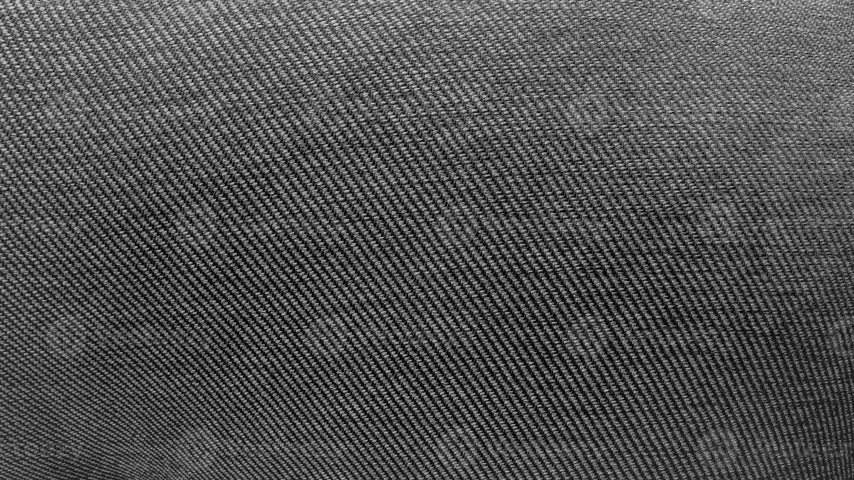 Dark black embossed fabric texture photo