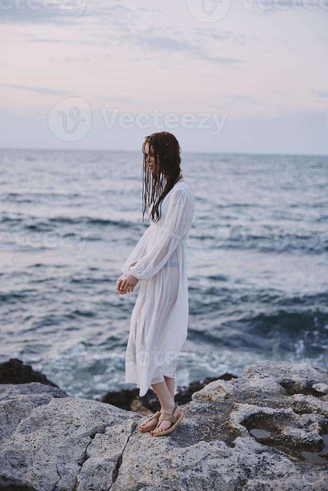 woman traveler white dress standing outdoor relax unaltered photo