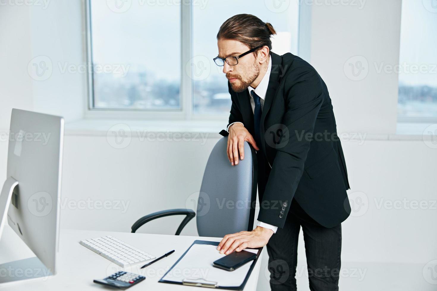 male manager documents in hand communication by phone executive photo