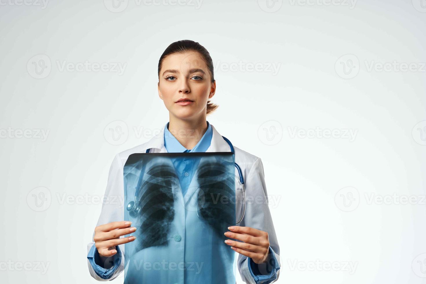 medical worker in white coat x-rays professional examination photo