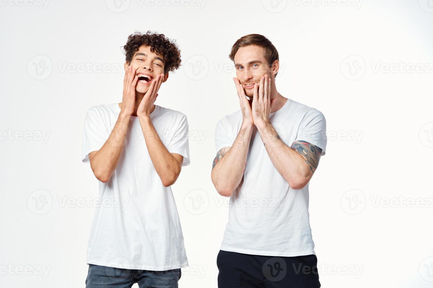 Cheerful friends angels t-shirts stand next to emotions isolated background photo