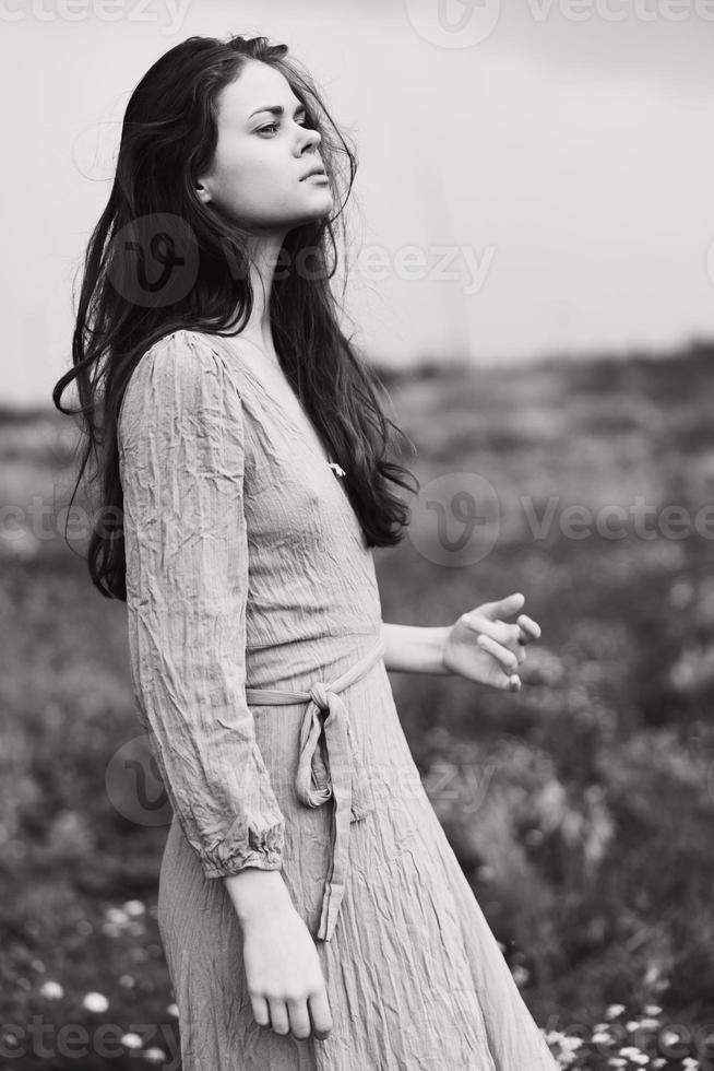 woman in dress dramatic style emotions posing black and white photo