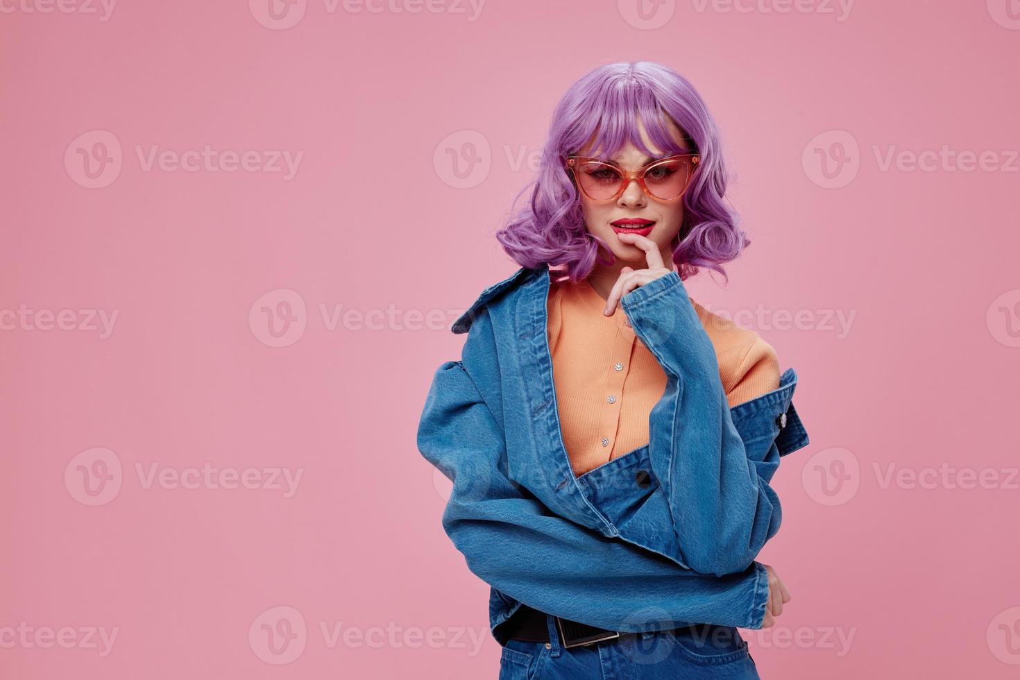Portrait of a charming lady purple hairstyle red lips denim jacket fun color background unaltered photo