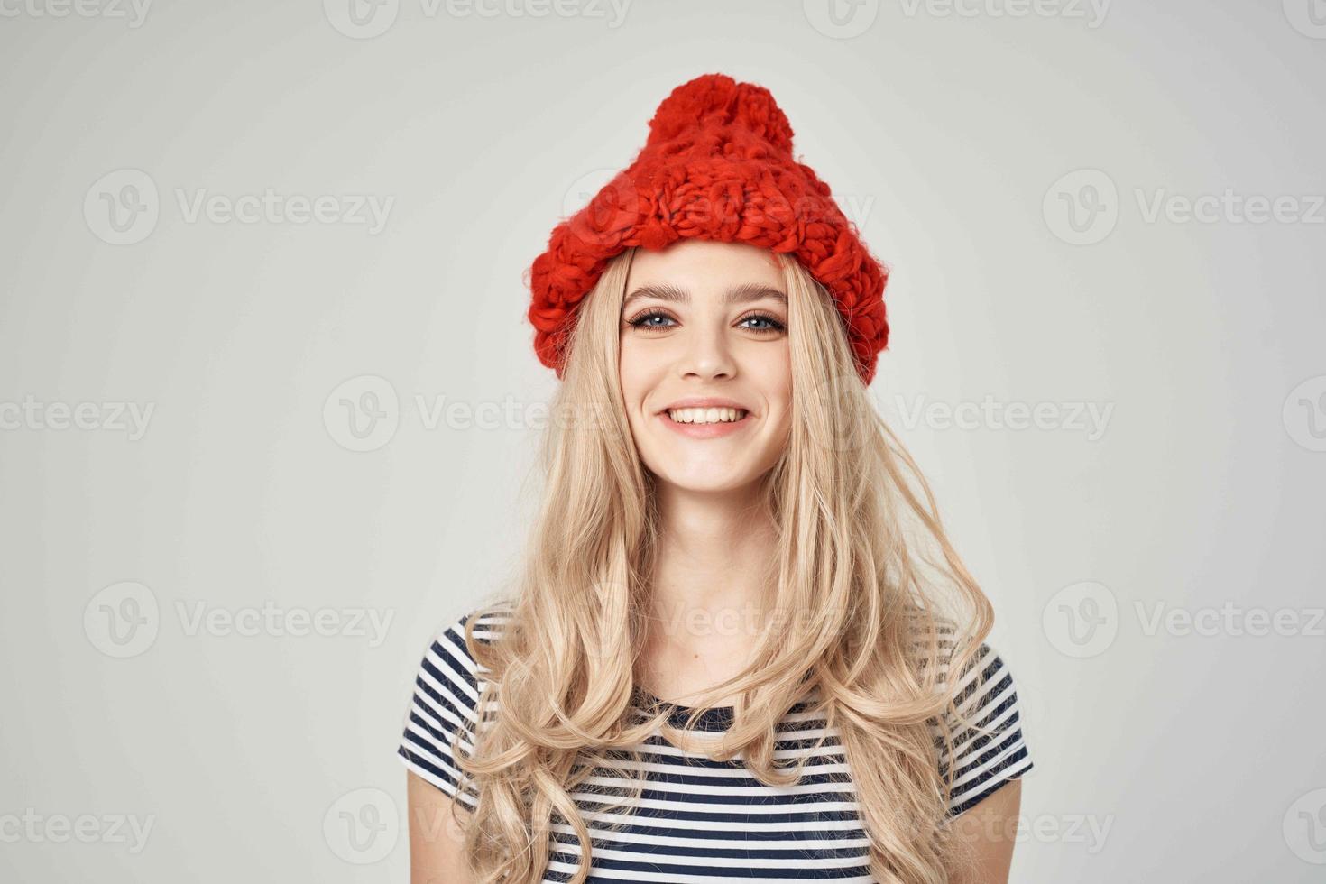 blonde in a striped T-shirt Red Hat cropped view glamor photo