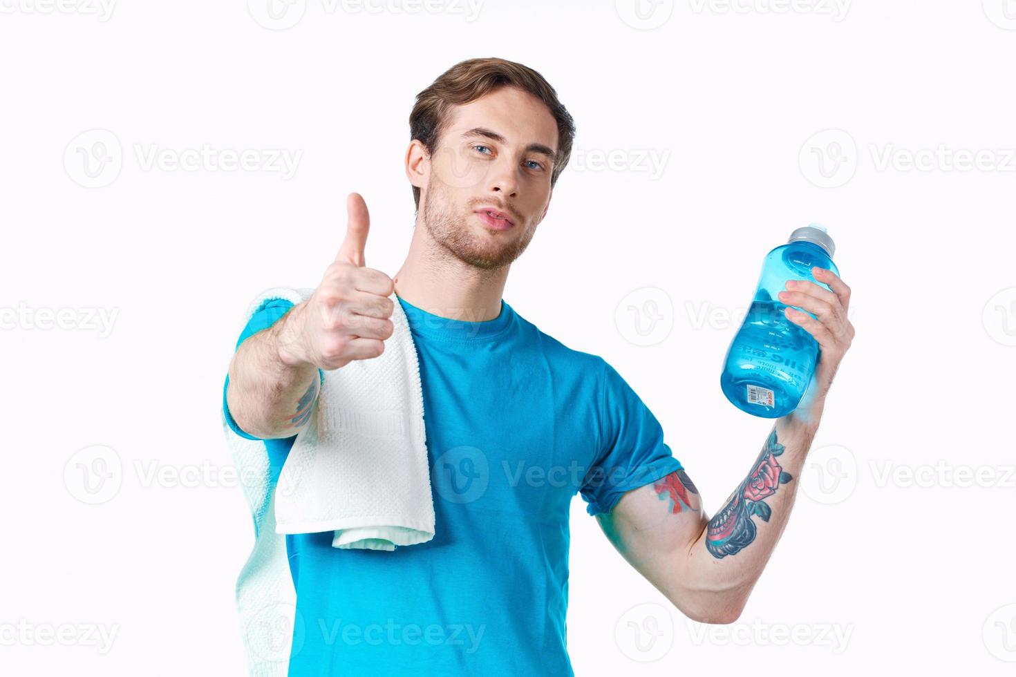 Cheerful man sport workout water bottle cropped view photo