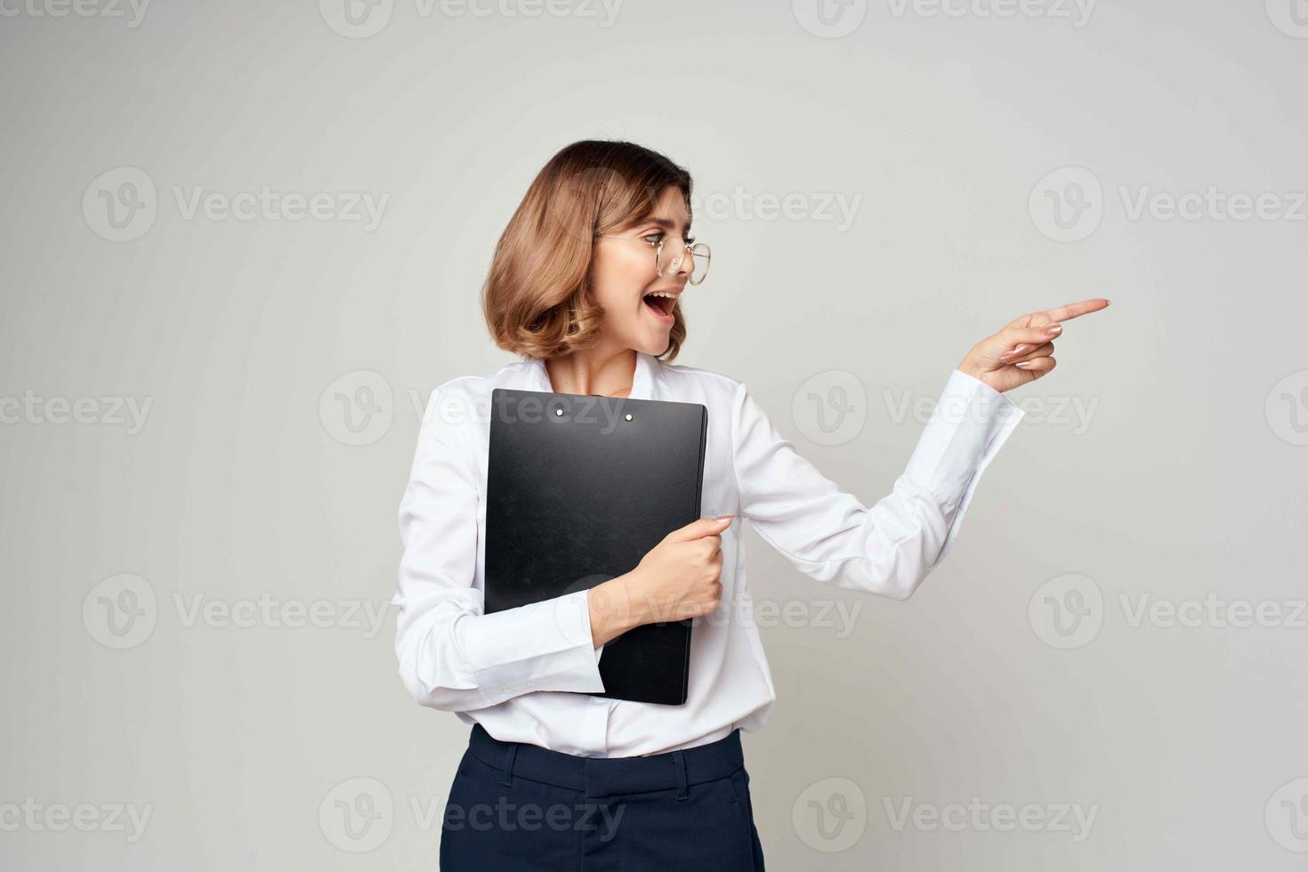 woman in white shirt documents office official success photo