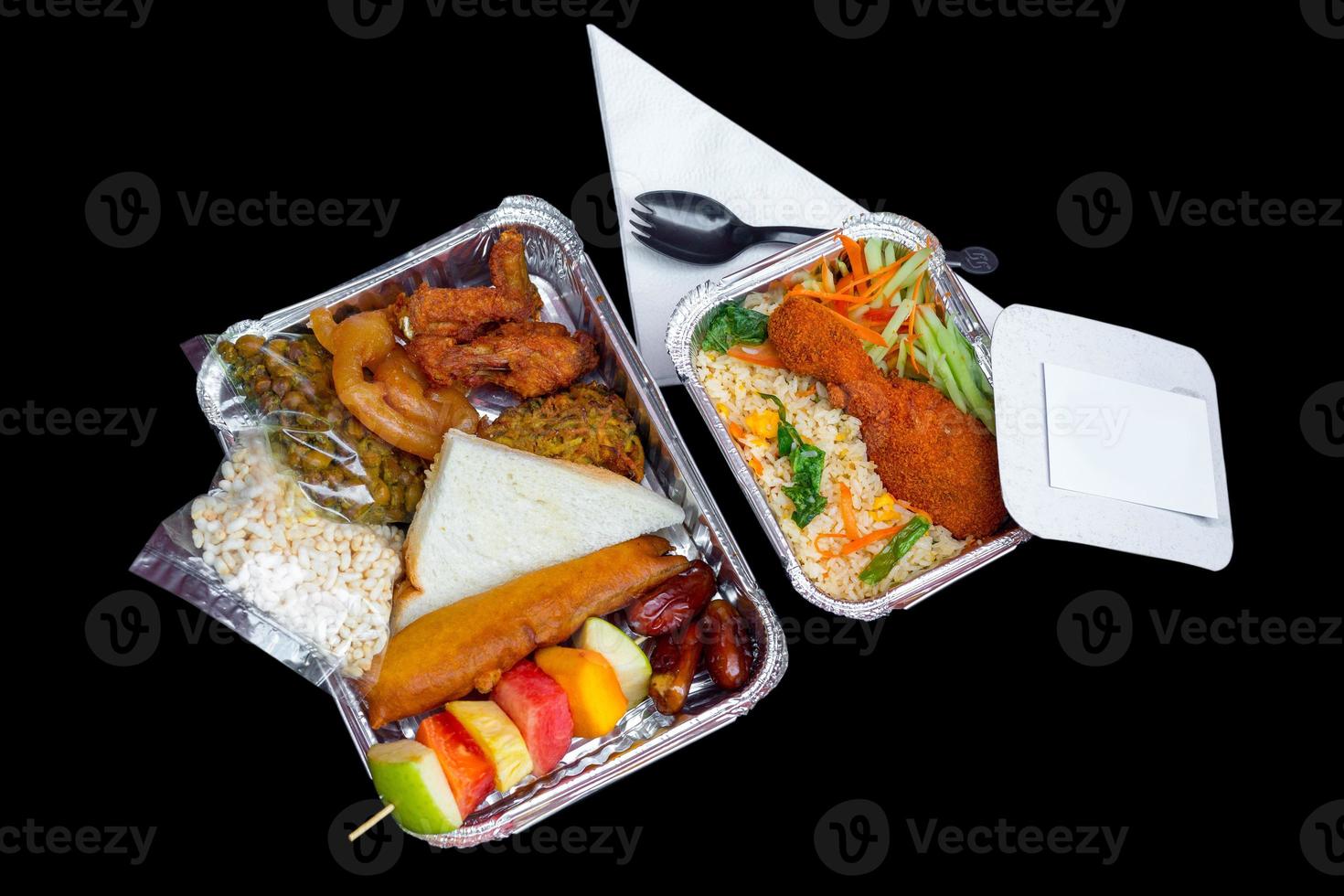 The Food Warmer Aluminum Foil Rectangular Disposable Parcel box. Ramadan iftar Take away delivery. 450ML Foil Container iftar food boxes. Top view, flat lay at white and Black background. photo