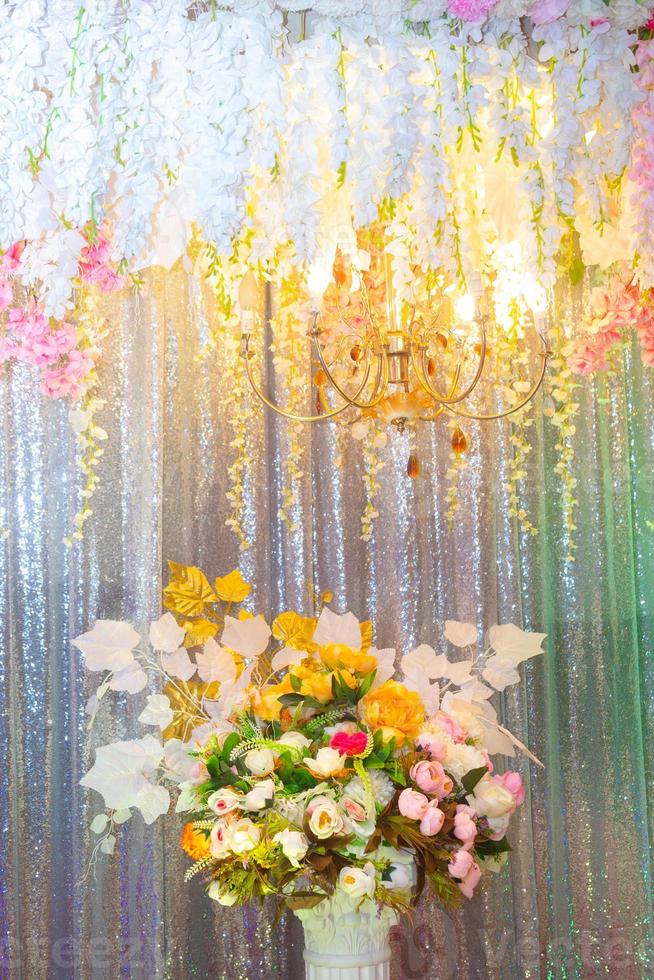 Hand made paper flower and decorative lighting, Wedding decoration stage in Bangladesh. photo