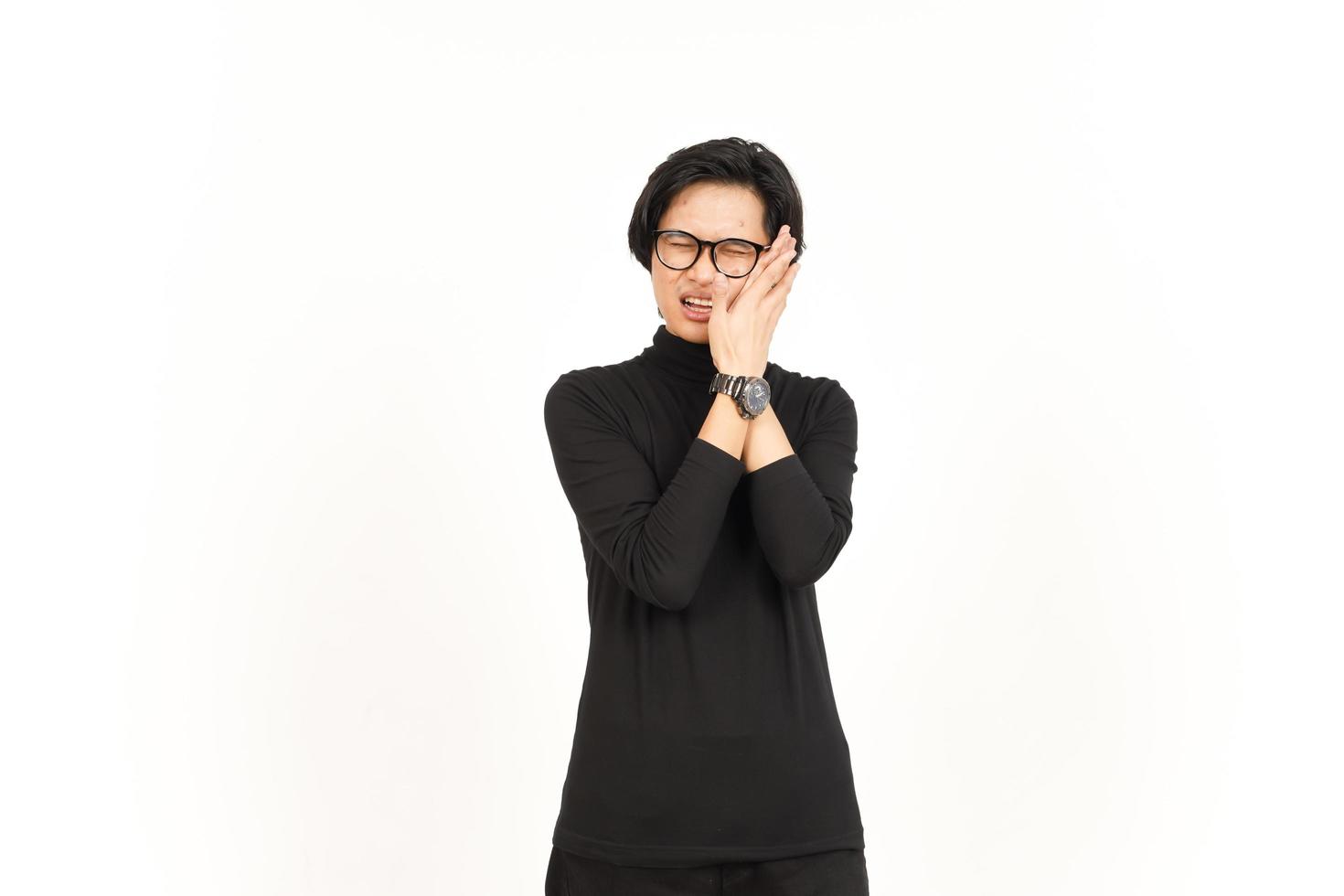 Suffering toothache gesture Of Handsome Asian Man Isolated On White Background photo