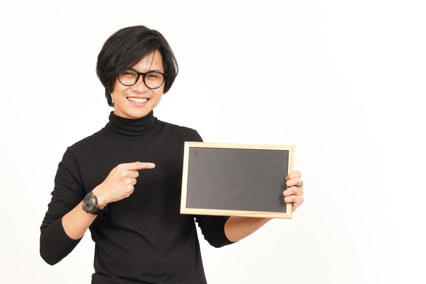 Showing, Presenting and holding Blank Blackboard Of Handsome Asian Man Isolated On White Background photo