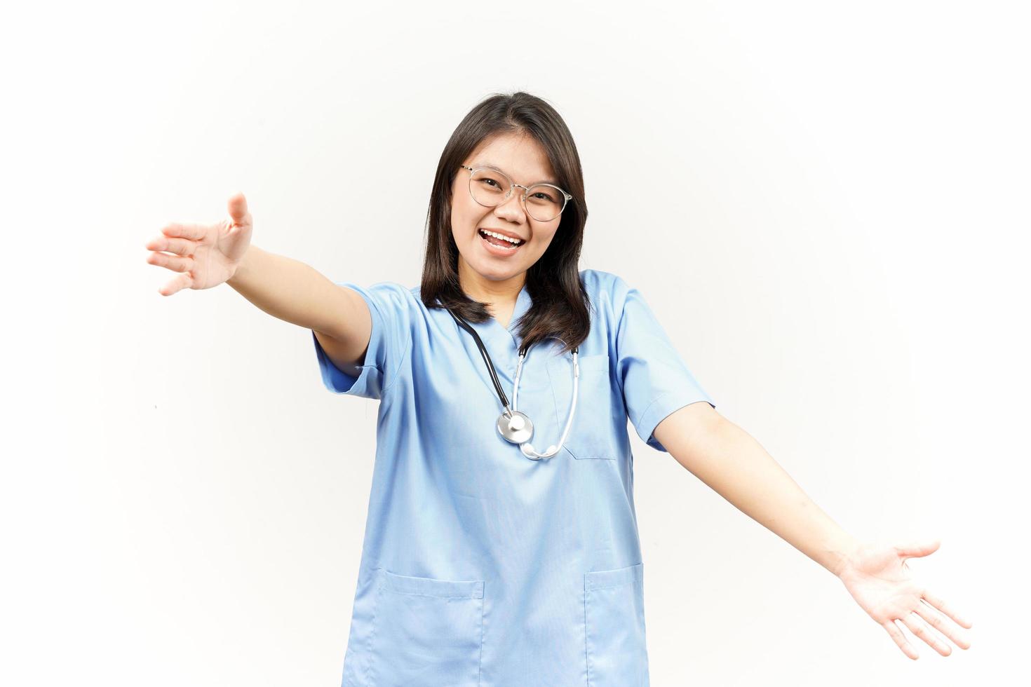 Offering Hug Of Asian Young Doctor Isolated On White Background photo