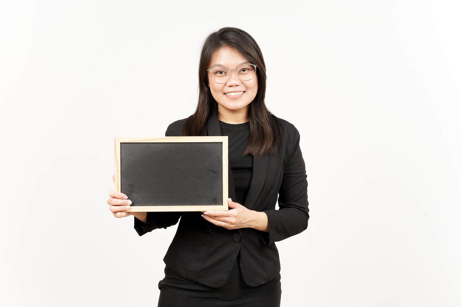 Showing, Presenting and holding Blank Blackboard Of Beautiful Asian Woman Wearing Black Blazer photo