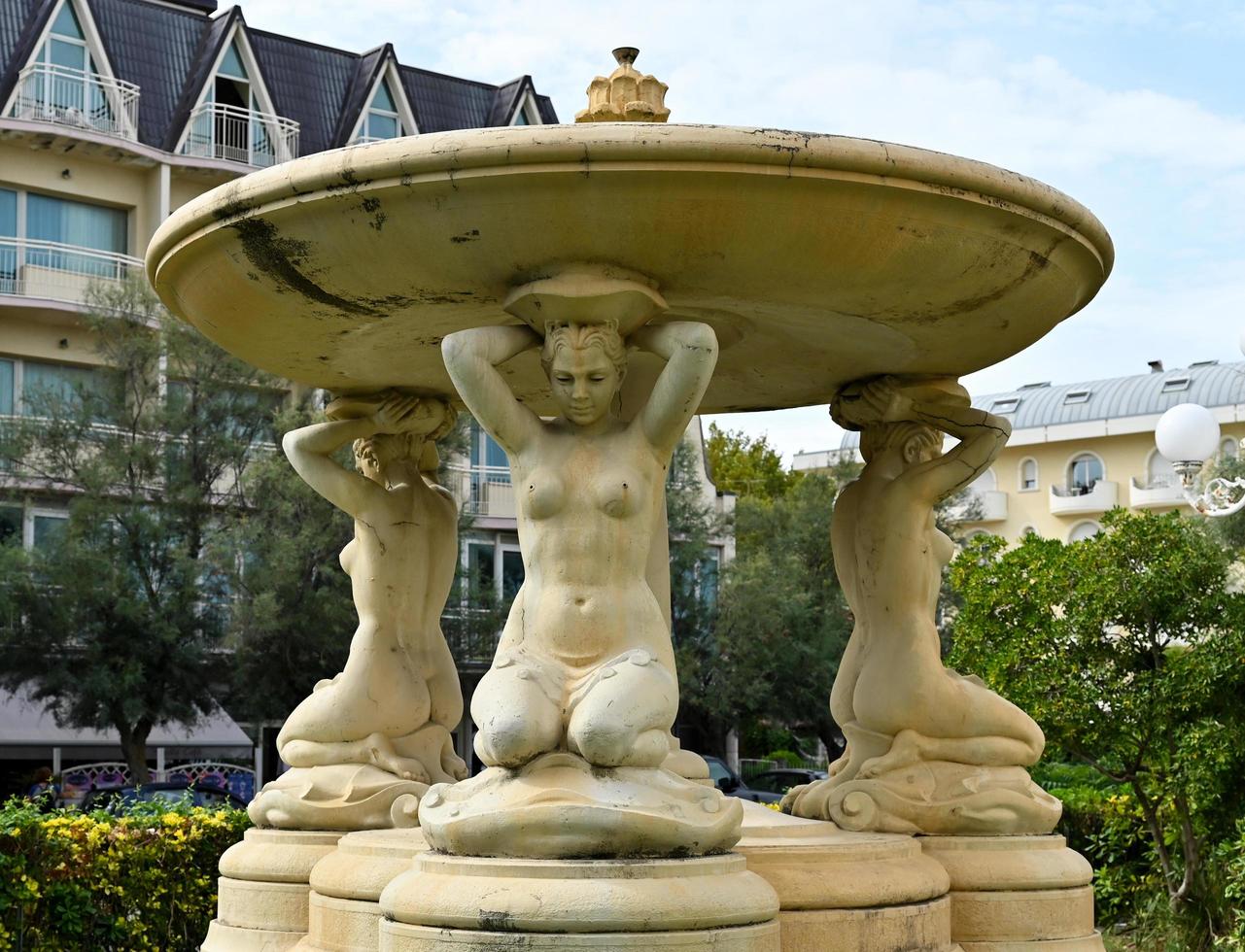 Cervia, Ravenna province, Italy September 14, 2022. The fountain was sculpted in 1929 and is located in front of the grand hotel in Cervia. photo