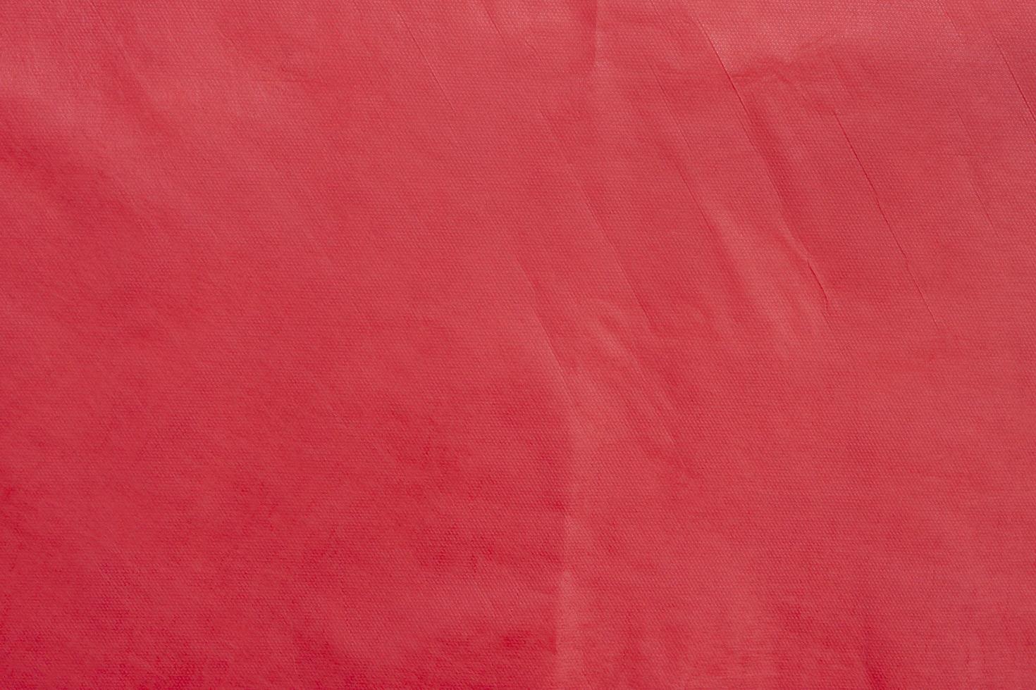 Background and texture of red mulberry paper with wrinkled. photo