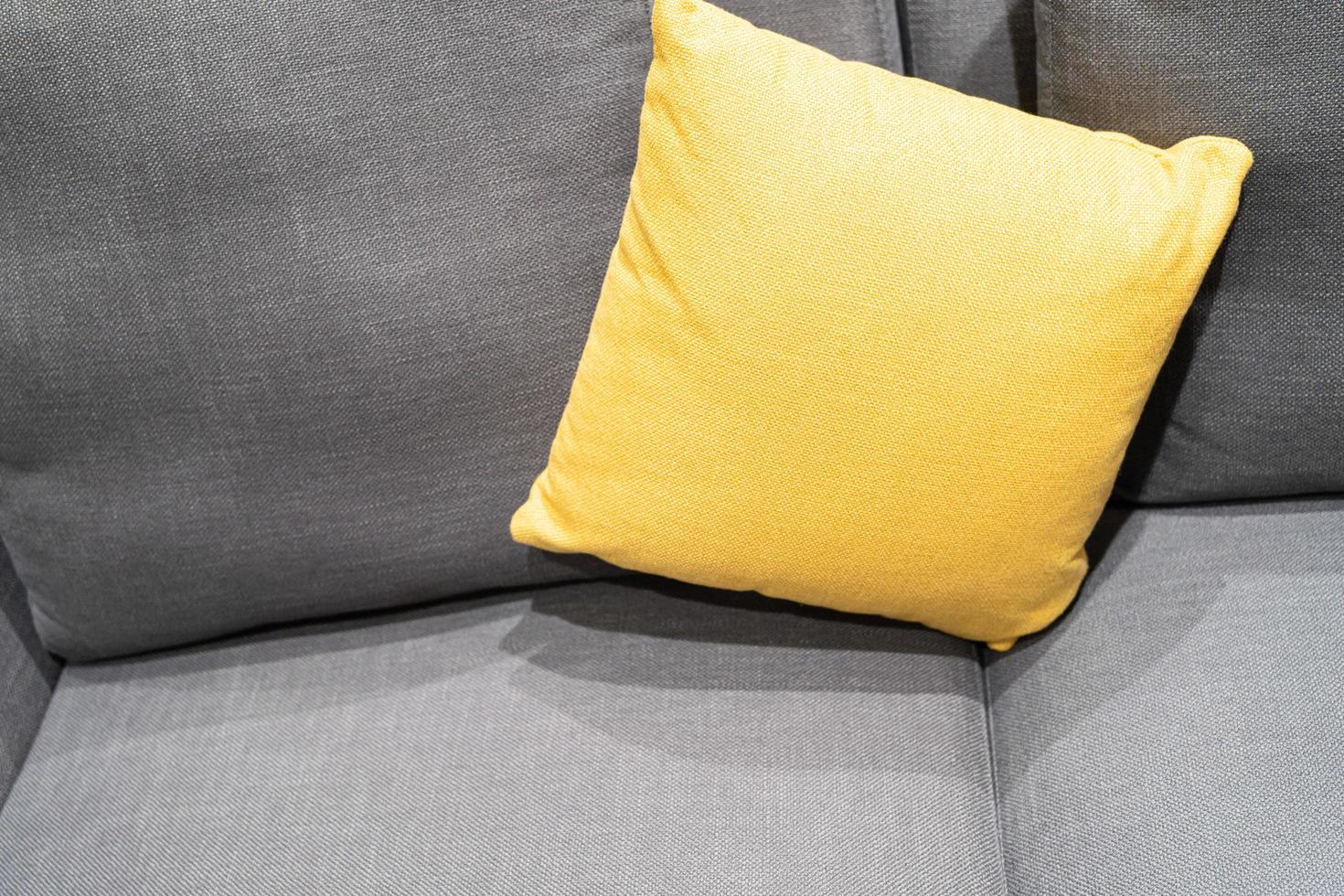 pillows on sofa in living room. close up home interior concept soft pillow in bedroom. home sweet home interior ideas photo