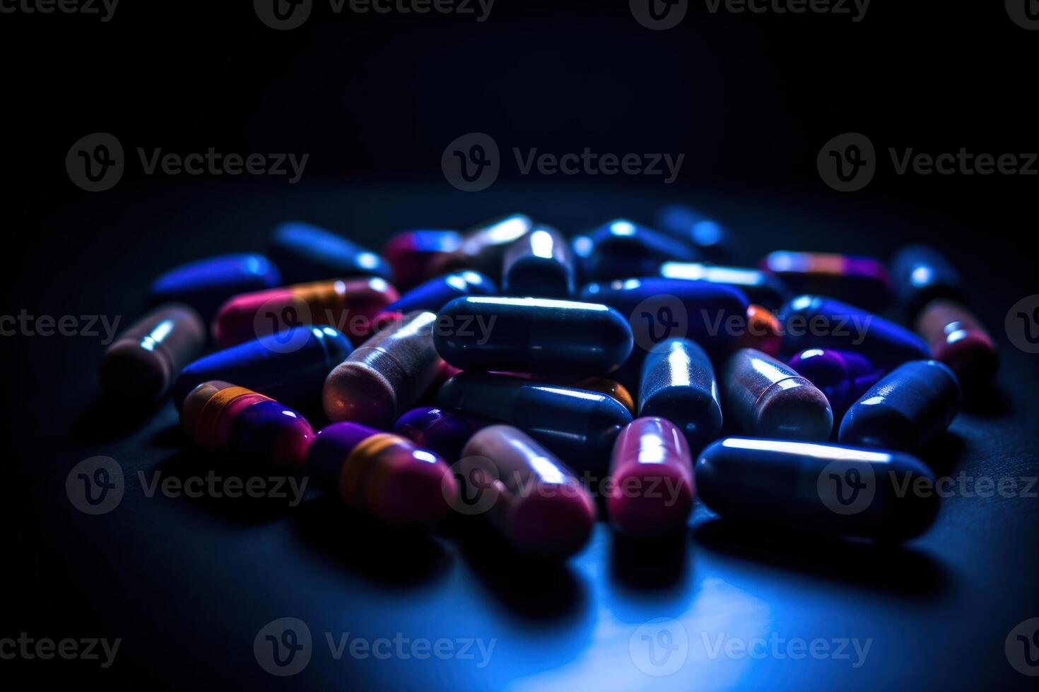 pill capsules on dark background photo