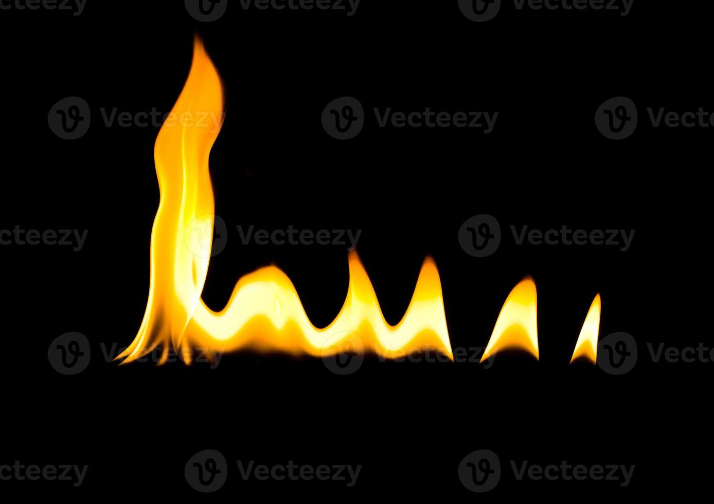 Fire flame isolate on black background. Burn flames, abstract texture. Art design for fire pattern, flame texture. photo