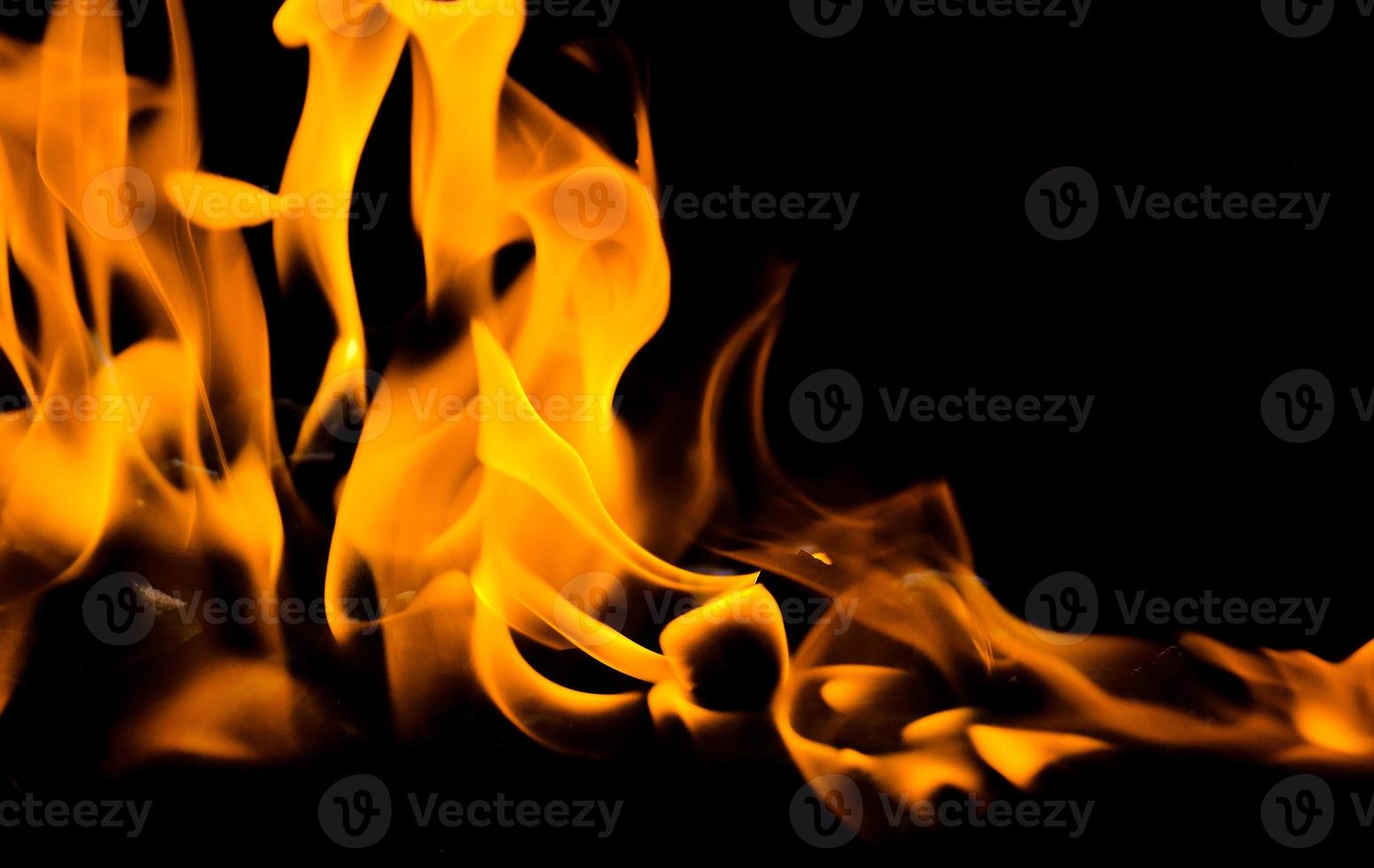 Fire flame isolate on black background. Burn flames, abstract texture. Art design for fire pattern, flame texture. photo