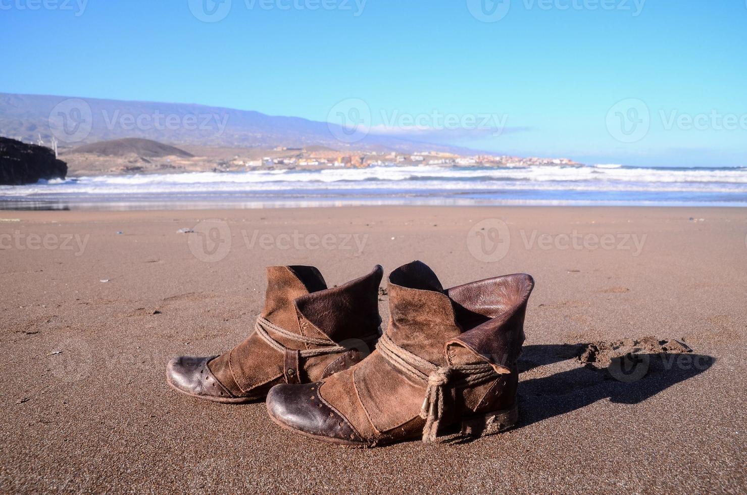 Boots on the beach photo