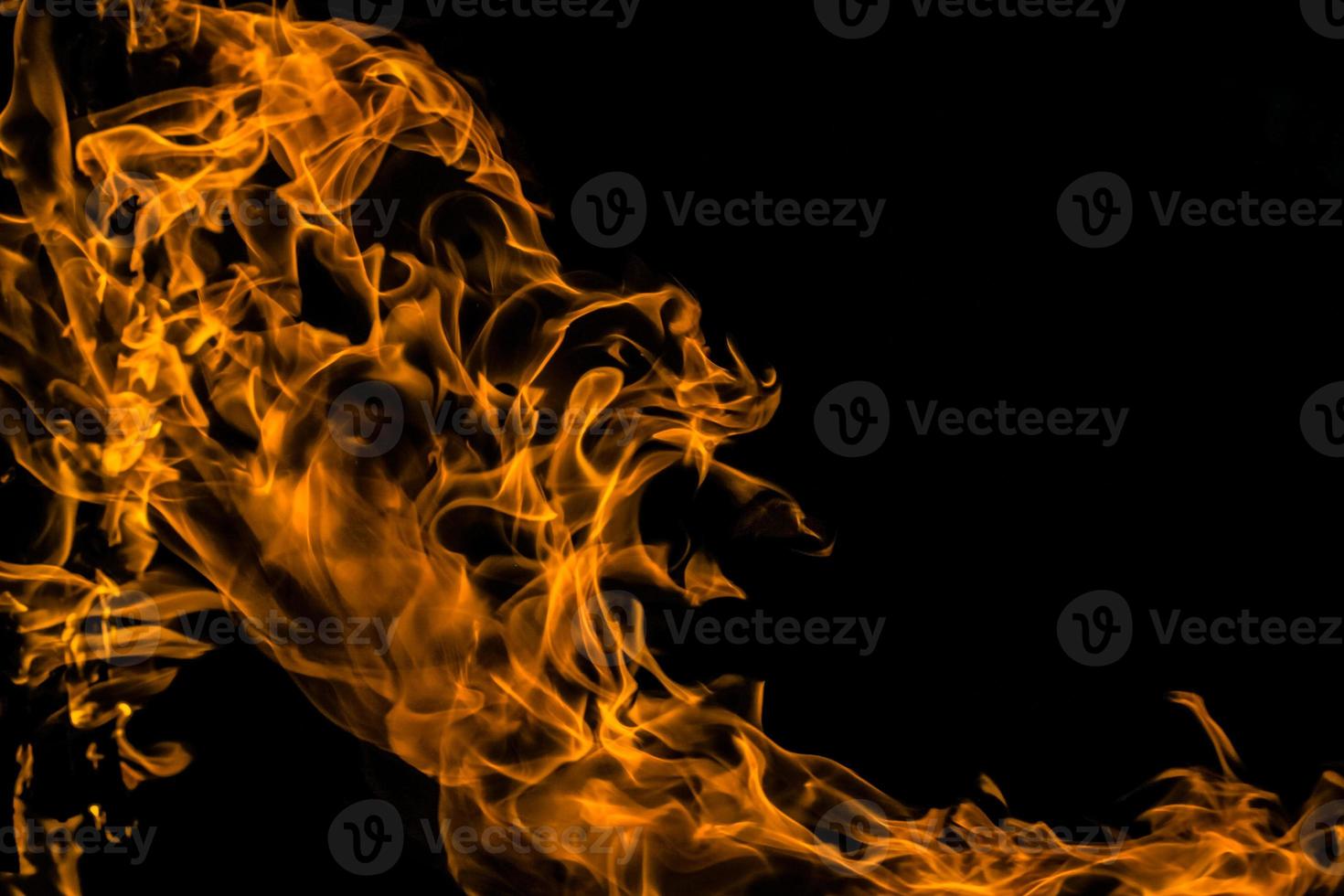 Fire flame isolate on black background. Burn flames, abstract texture. Art design for fire pattern, flame texture. photo