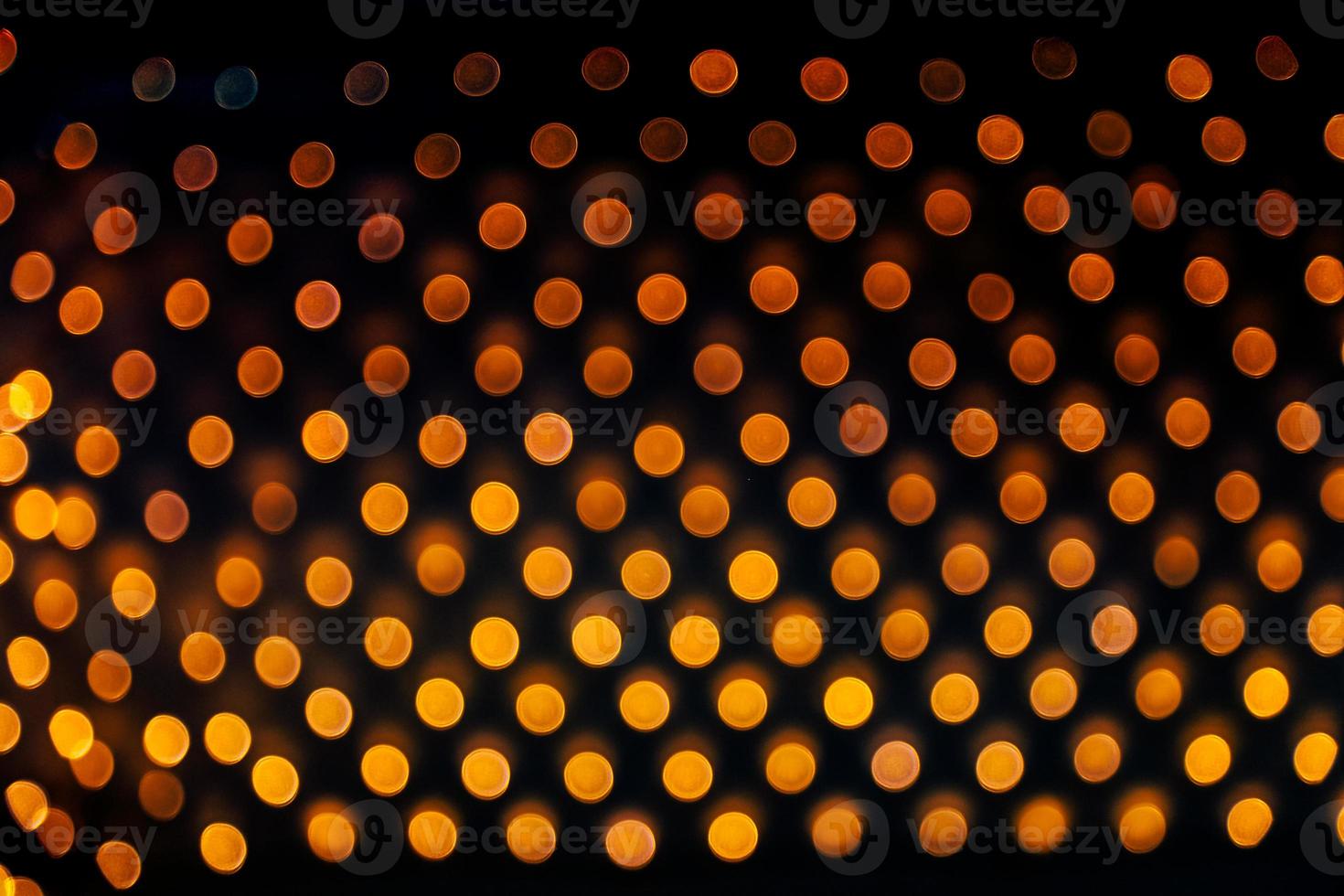 abstract bokeh background of golden light burst made from bokeh motion. photo
