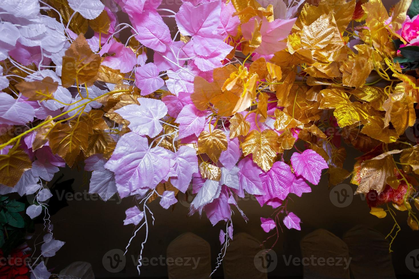 Golden leaf Hand made paper flower, Wedding decoration and colorful wedding stage in Bangladesh. photo