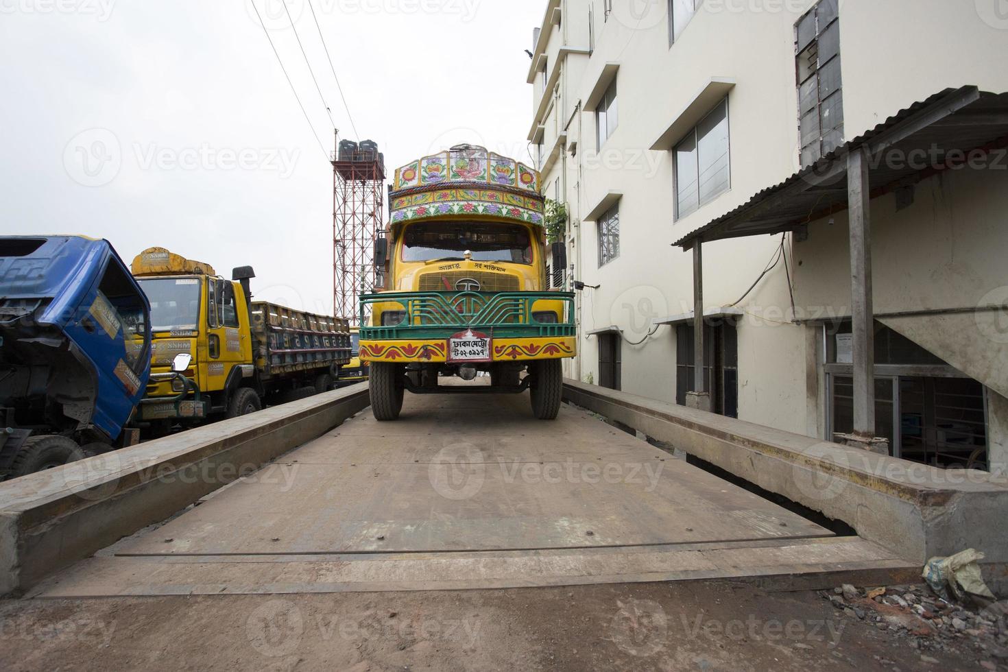 Pit Type Weighbridge, A truck to be weighed is directly driven to the platform of a weighbridge at Demra, Dhaka, Bangladesh. photo