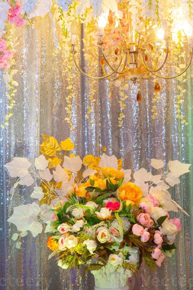 Hand made paper flower and decorative lighting, Wedding decoration stage in Bangladesh. photo