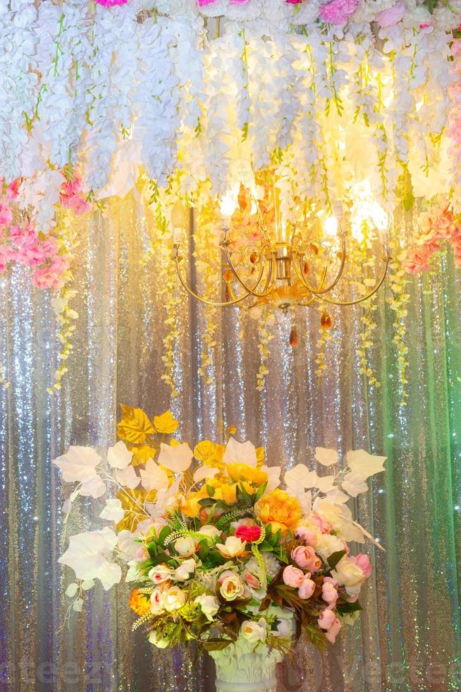 Hand made paper flower and decorative lighting, Wedding decoration stage in Bangladesh. photo