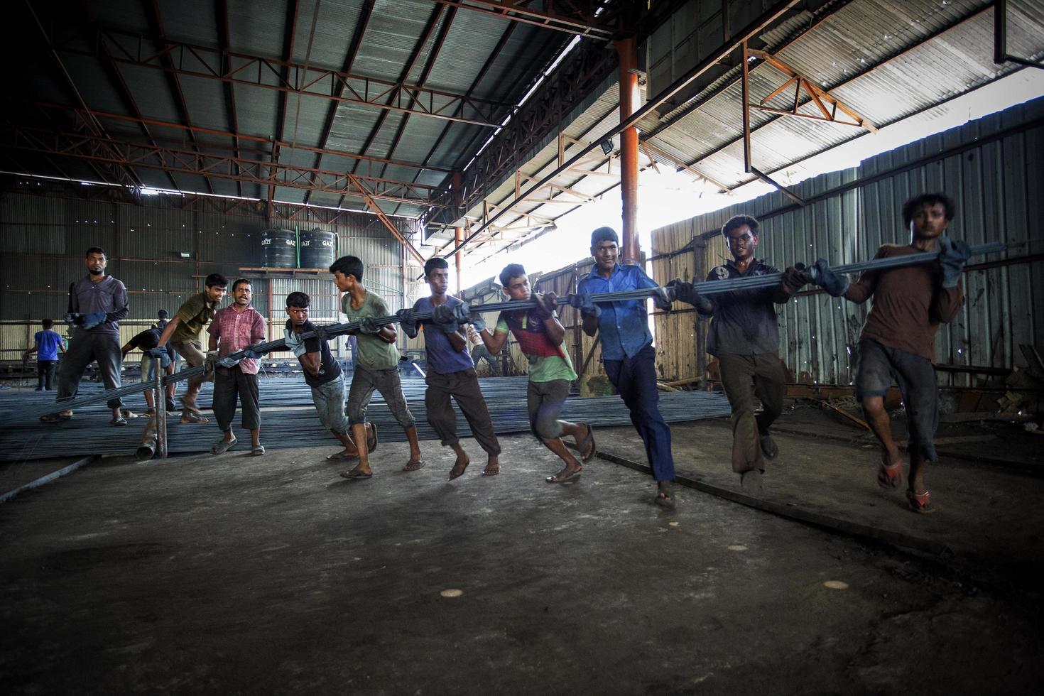 Bangladesh May 20, 2015 Heated metal gets squeezed and running, risky workers in steel f photo