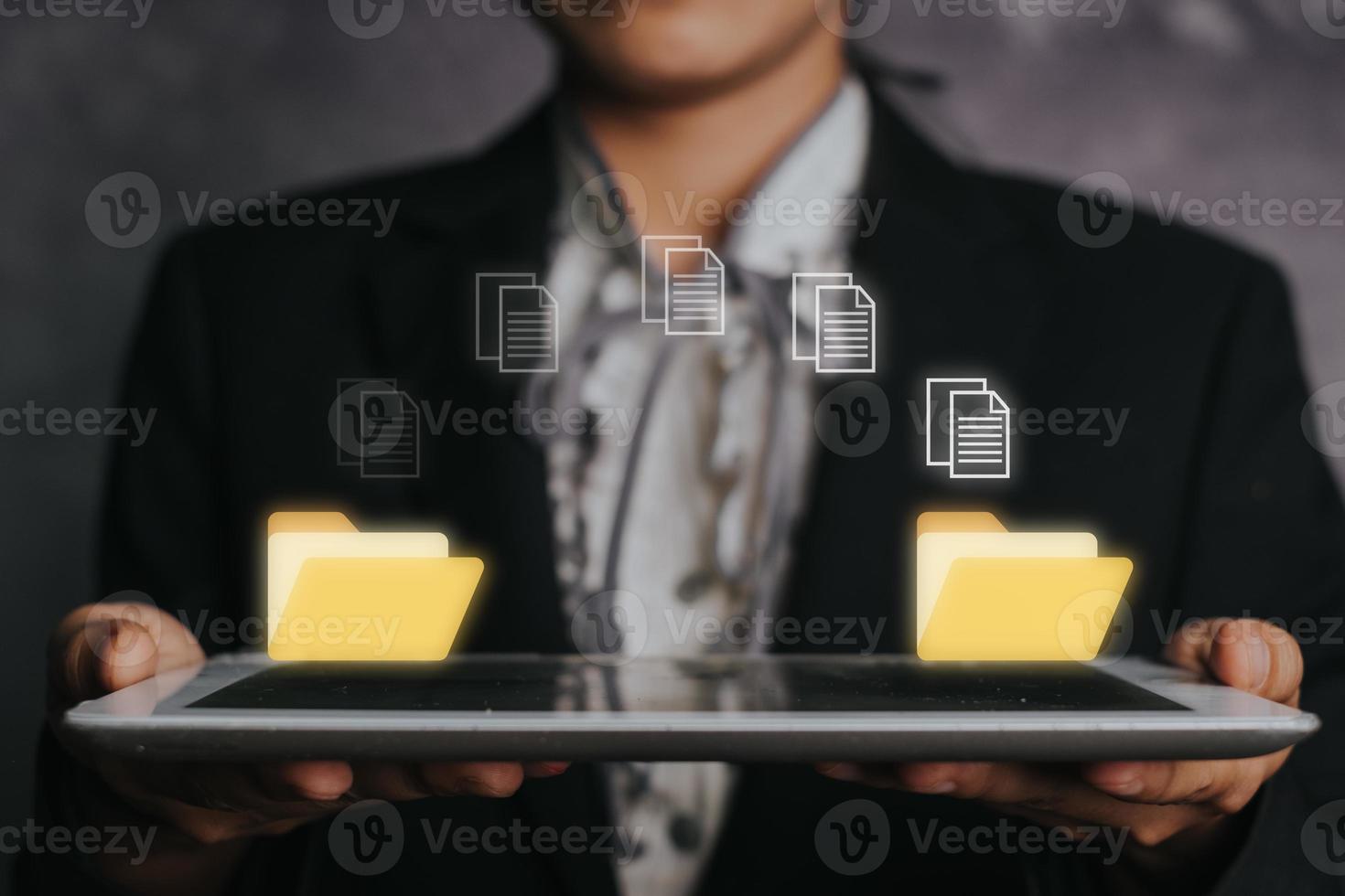 Transfer files data system relocation concept, Business woman using digital tablet waiting for transfer file process icon on virtual screen. photo